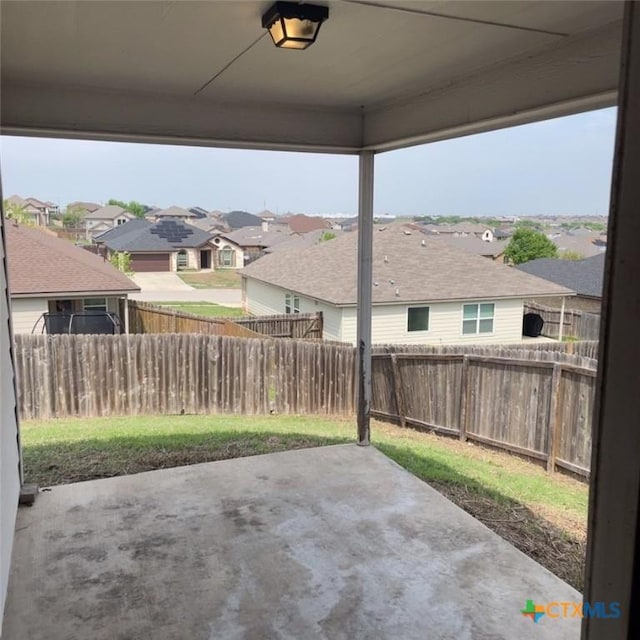 3805 Flat Rock Mountain Dr, Killeen, TX 76549 - view of patio with a residential view and a fenced backyard