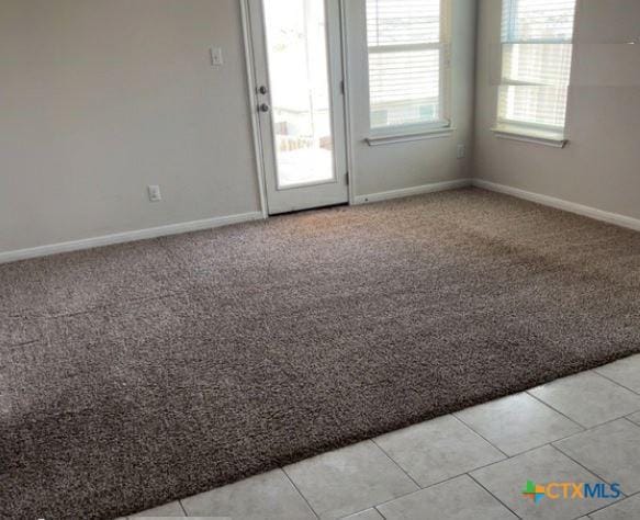 3805 Flat Rock Mountain Dr, Killeen, TX 76549 - empty room featuring light colored carpet and baseboards