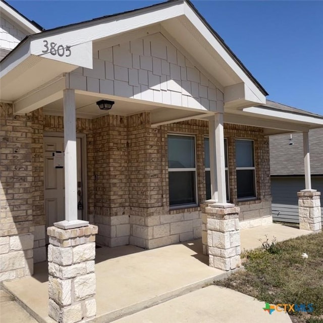 3805 Flat Rock Mountain Dr, Killeen, TX 76549 - view of exterior entry with brick siding and covered porch
