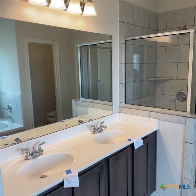 3805 Flat Rock Mountain Dr, Killeen, TX 76549 - full bath featuring double vanity, a bath, a sink, and toilet