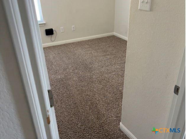 3805 Flat Rock Mountain Dr, Killeen, TX 76549 - room details with carpet flooring and baseboards