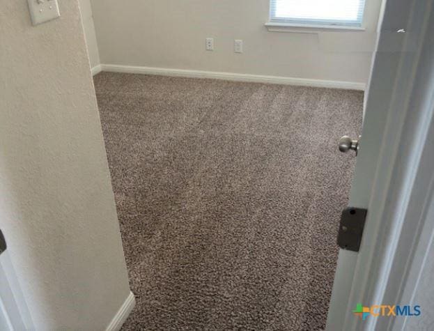 3805 Flat Rock Mountain Dr, Killeen, TX 76549 - spare room with carpet and baseboards