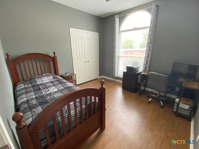 406 Windy Way Dr, Victoria, TX 77904 - bedroom featuring wood finished floors and a closet