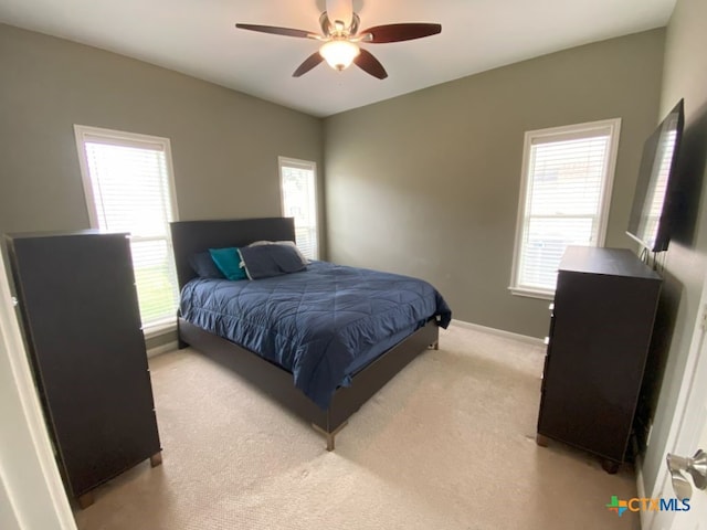 406 Windy Way Dr, Victoria, TX 77904 - bedroom featuring light carpet and ceiling fan
