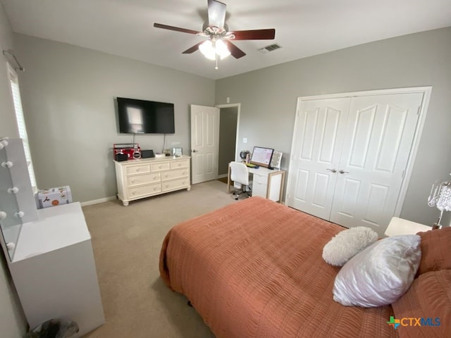 406 Windy Way Dr, Victoria, TX 77904 - bedroom featuring light carpet, a closet, and ceiling fan