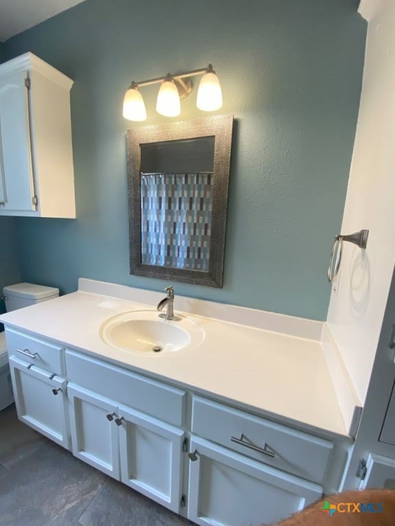 406 Windy Way Dr, Victoria, TX 77904 - bathroom with vanity and toilet