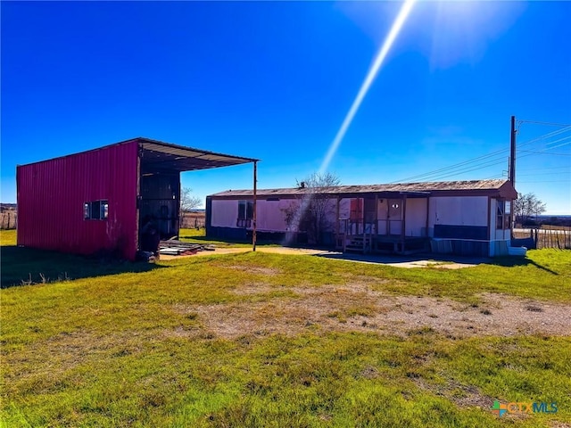 view of yard featuring a carport