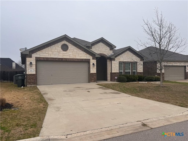 view of front of property featuring a garage, brick siding, and concrete driveway