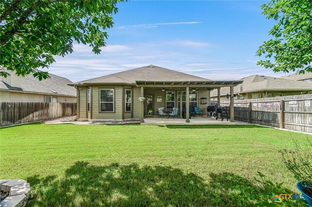 5642 Briar Knl, New Braunfels, TX 78132 - back of property with a fenced backyard, ceiling fan, and a patio