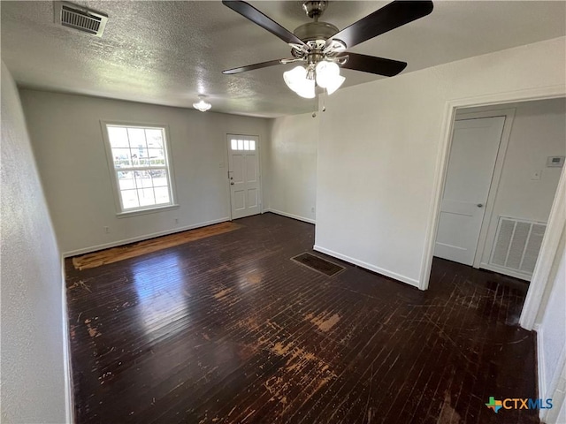 interior space with visible vents and hardwood / wood-style flooring