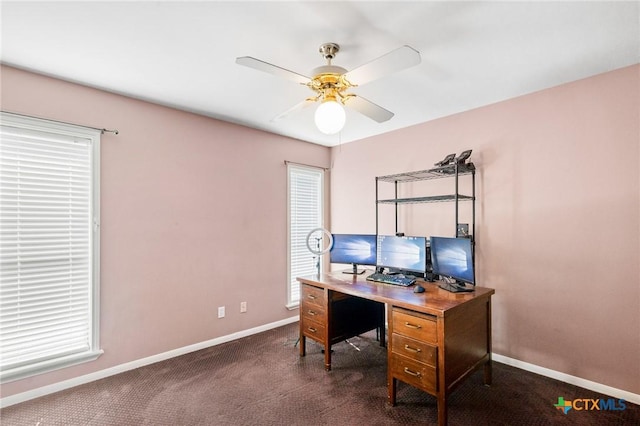 home office featuring baseboards, dark colored carpet, and ceiling fan