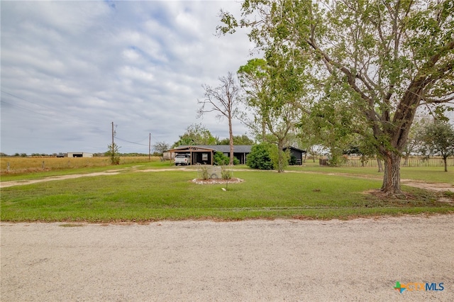 view of front of property with a front lawn