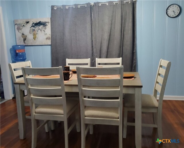 dining room with dark hardwood / wood-style floors