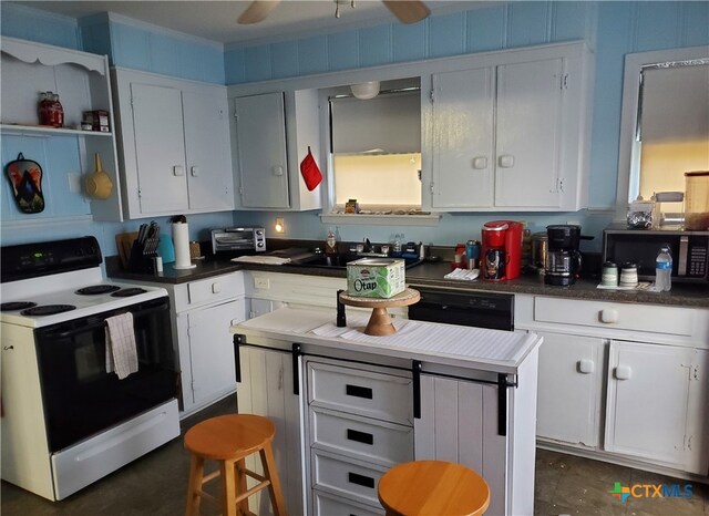 kitchen with electric stove, sink, black dishwasher, and white cabinets