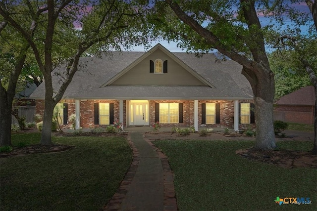 104 Twelve Oaks Dr, Temple, TX 76504 - view of front of property featuring brick siding and a front lawn
