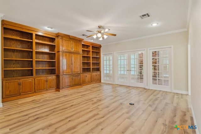 104 Twelve Oaks Dr, Temple, TX 76504 - unfurnished living room featuring visible vents, baseboards, ornamental molding, ceiling fan, and light wood-style flooring