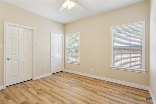 104 Twelve Oaks Dr, Temple, TX 76504 - unfurnished bedroom featuring baseboards and light wood-style floors
