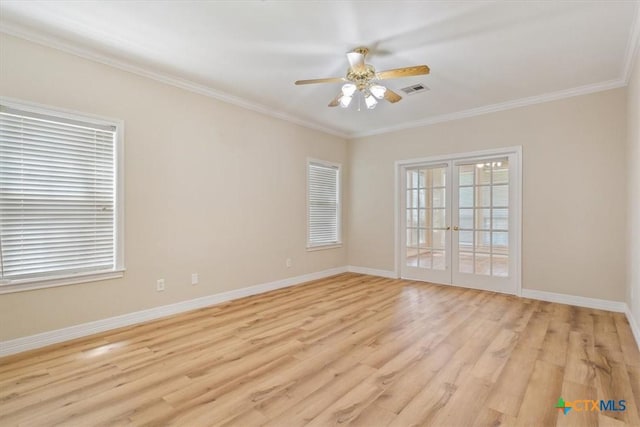104 Twelve Oaks Dr, Temple, TX 76504 - spare room featuring ornamental molding, visible vents, baseboards, and light wood-style floors