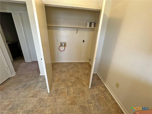 laundry room featuring hookup for a washing machine, baseboards, laundry area, and electric dryer hookup