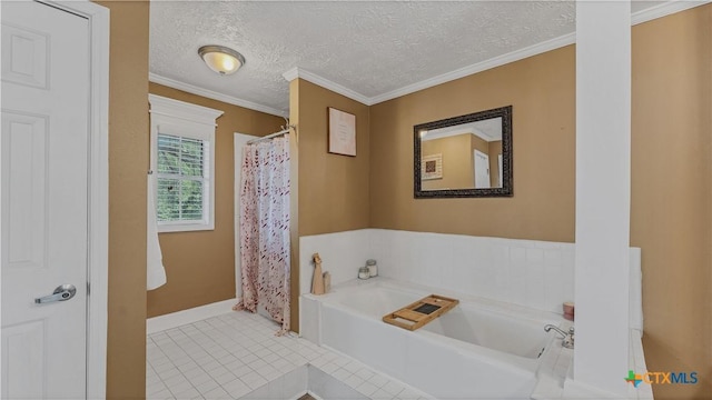 bathroom featuring tile patterned flooring, ornamental molding, a washtub, and a textured ceiling