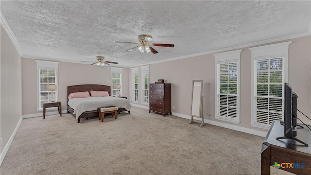 bedroom featuring crown molding, light colored carpet, ceiling fan, and a textured ceiling