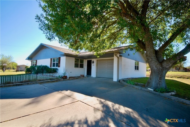 ranch-style house with a garage