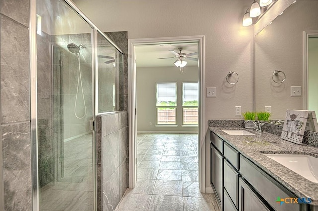 2002 Hayes St, Temple, TX 76502 - full bath with double vanity, a ceiling fan, a sink, and a stall shower