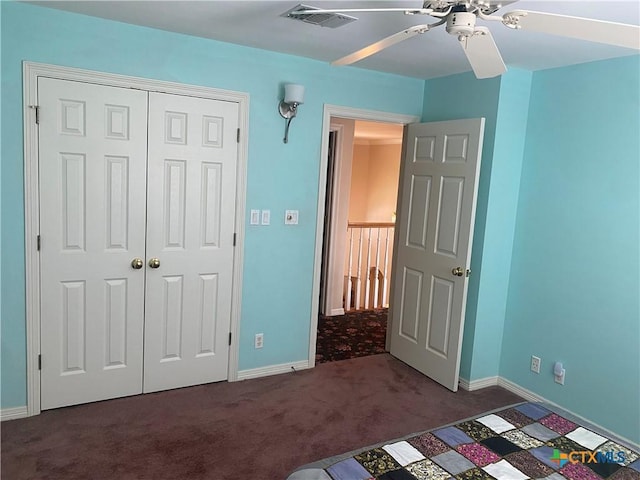 104 Woodcreek Cir, Victoria, TX 77904 - unfurnished bedroom with carpet, a closet, baseboards, and a ceiling fan