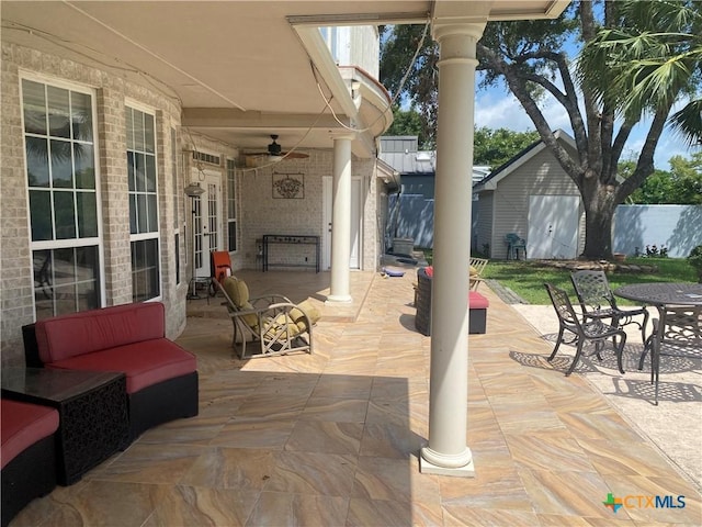 104 Woodcreek Cir, Victoria, TX 77904 - view of patio featuring outdoor dining area and a ceiling fan