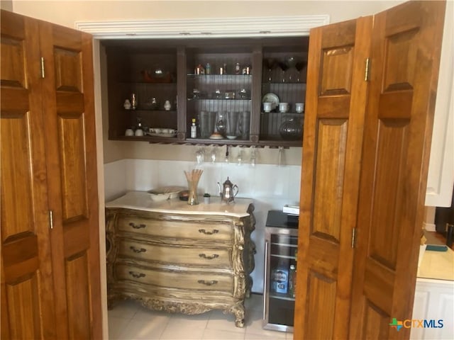 104 Woodcreek Cir, Victoria, TX 77904 - indoor wet bar with tile patterned flooring