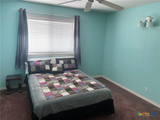 104 Woodcreek Cir, Victoria, TX 77904 - bedroom featuring carpet, baseboards, and ceiling fan