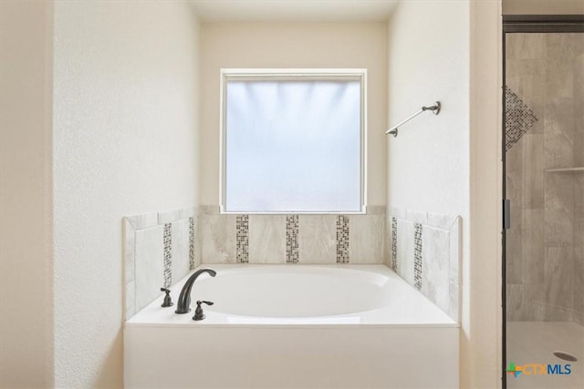 1129 Wren Cir, Copperas Cove, TX 76522 - bathroom featuring a shower stall and a bath