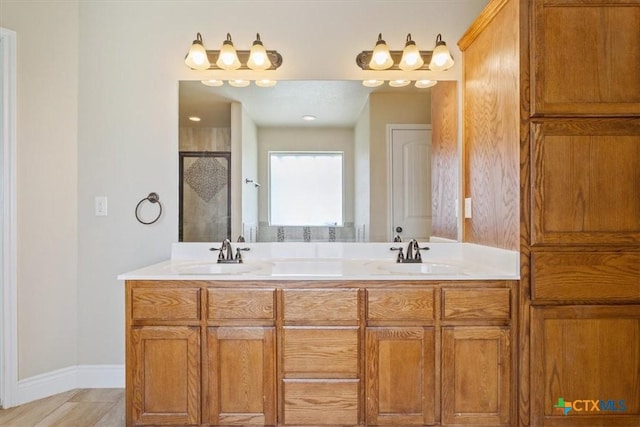 1129 Wren Cir, Copperas Cove, TX 76522 - full bathroom featuring a shower stall and double vanity