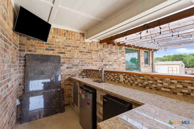 1129 Wren Cir, Copperas Cove, TX 76522 - view of patio featuring a sink and exterior kitchen