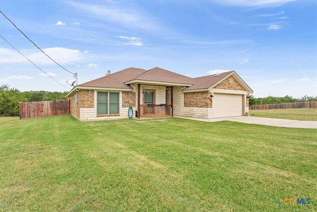 1129 Wren Cir, Copperas Cove, TX 76522 - view of front of house featuring a garage, driveway, brick siding, and roof with shingles