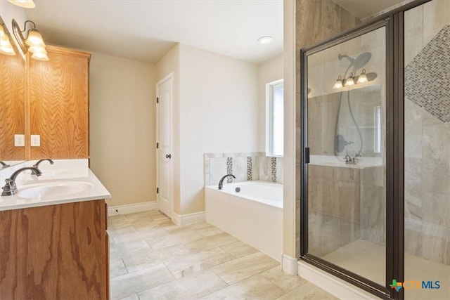 1129 Wren Cir, Copperas Cove, TX 76522 - bathroom featuring a bath, a stall shower, and double vanity