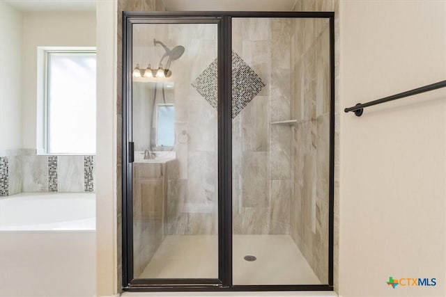 1129 Wren Cir, Copperas Cove, TX 76522 - full bathroom featuring a bath, a stall shower, and vanity
