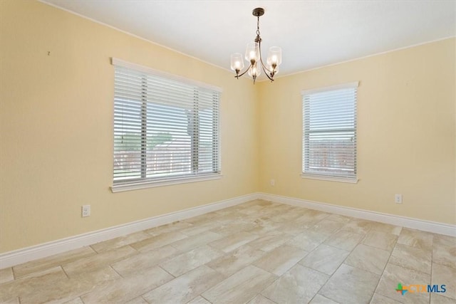 1129 Wren Cir, Copperas Cove, TX 76522 - unfurnished room featuring a chandelier and healthy amount of natural light