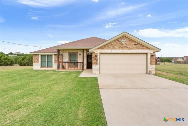 1129 Wren Cir, Copperas Cove, TX 76522 - single story home with a garage, brick siding, concrete driveway, and a front lawn