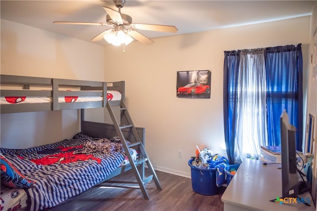 bedroom featuring ceiling fan and dark hardwood / wood-style flooring