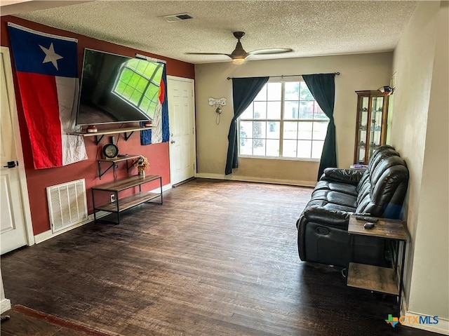 2503 E Mistletoe Ave, Victoria, TX 77901 - living room featuring wood finished floors, ceiling fan, and a textured ceiling
