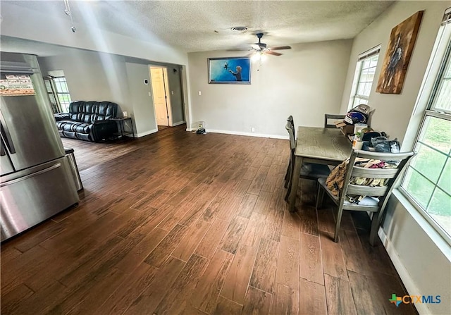2503 E Mistletoe Ave, Victoria, TX 77901 - dining area with ceiling fan, dark wood-style floors, and a textured ceiling