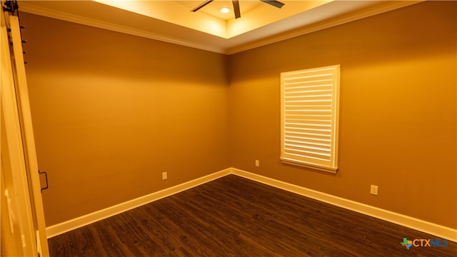 empty room featuring hardwood / wood-style floors, ornamental molding, and ceiling fan