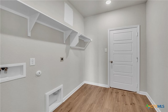 laundry room with hookup for an electric dryer, washer hookup, light hardwood / wood-style flooring, and gas dryer hookup