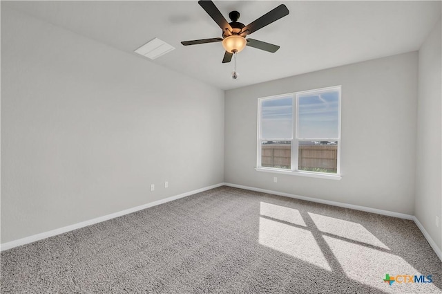 carpeted empty room featuring ceiling fan