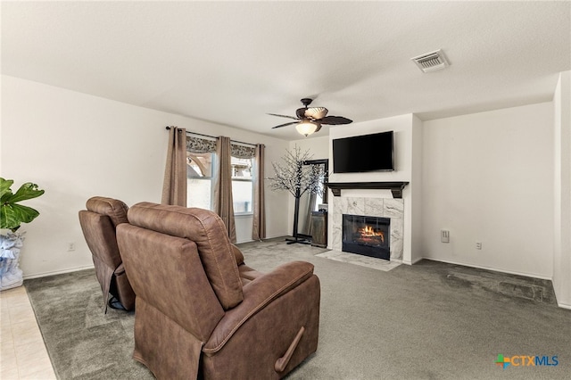 3946 Legend Pond, New Braunfels, TX 78130 - carpeted living area featuring a fireplace, a ceiling fan, and baseboards