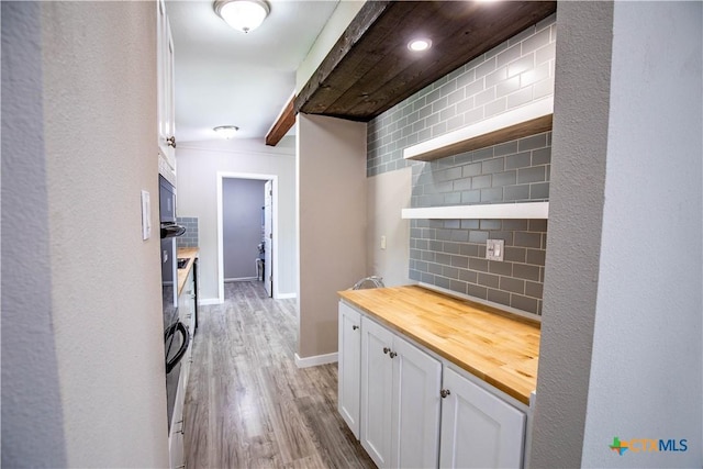 hallway featuring light hardwood / wood-style floors