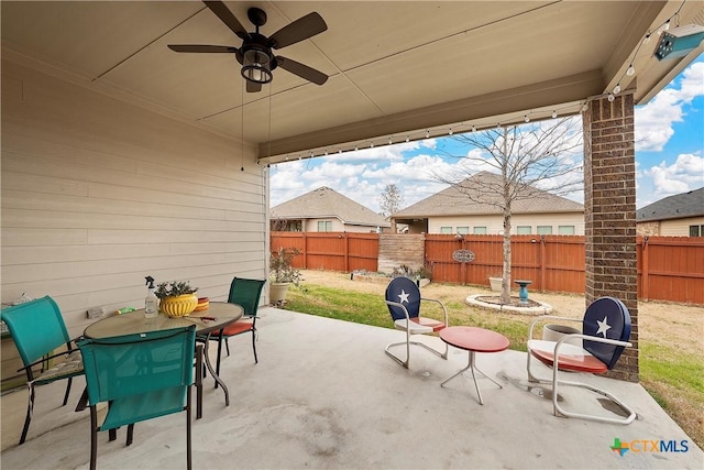 view of patio with ceiling fan