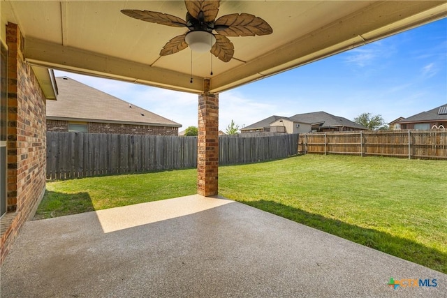 view of patio featuring a fenced backyard and a ceiling fan