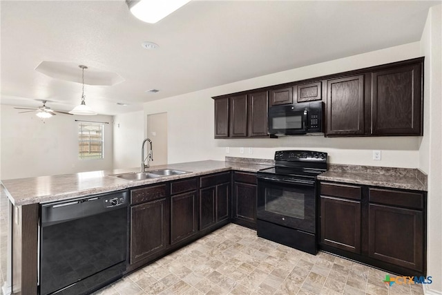 kitchen featuring a peninsula, a sink, dark brown cabinets, pendant lighting, and black appliances